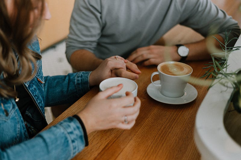 Two individuals engrossed in a deep conversation, highlighting the emotional connection central to understanding emotional affairs.